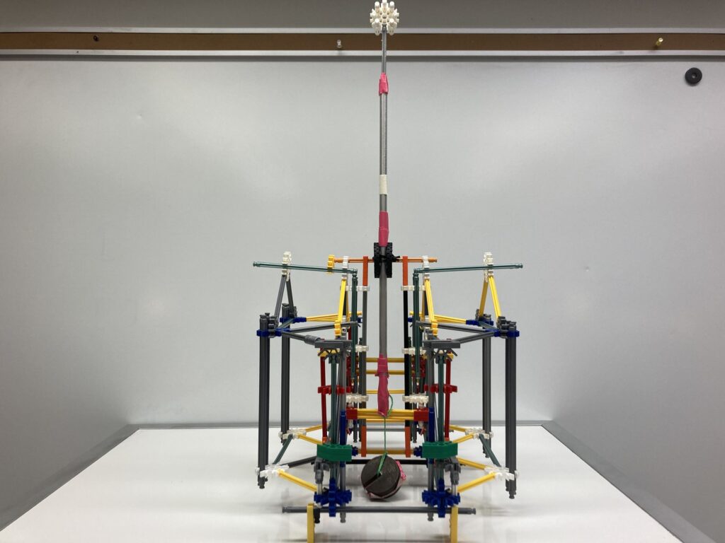 A K'Nex Trebuchet with a hinged counterweight and fixed projectile